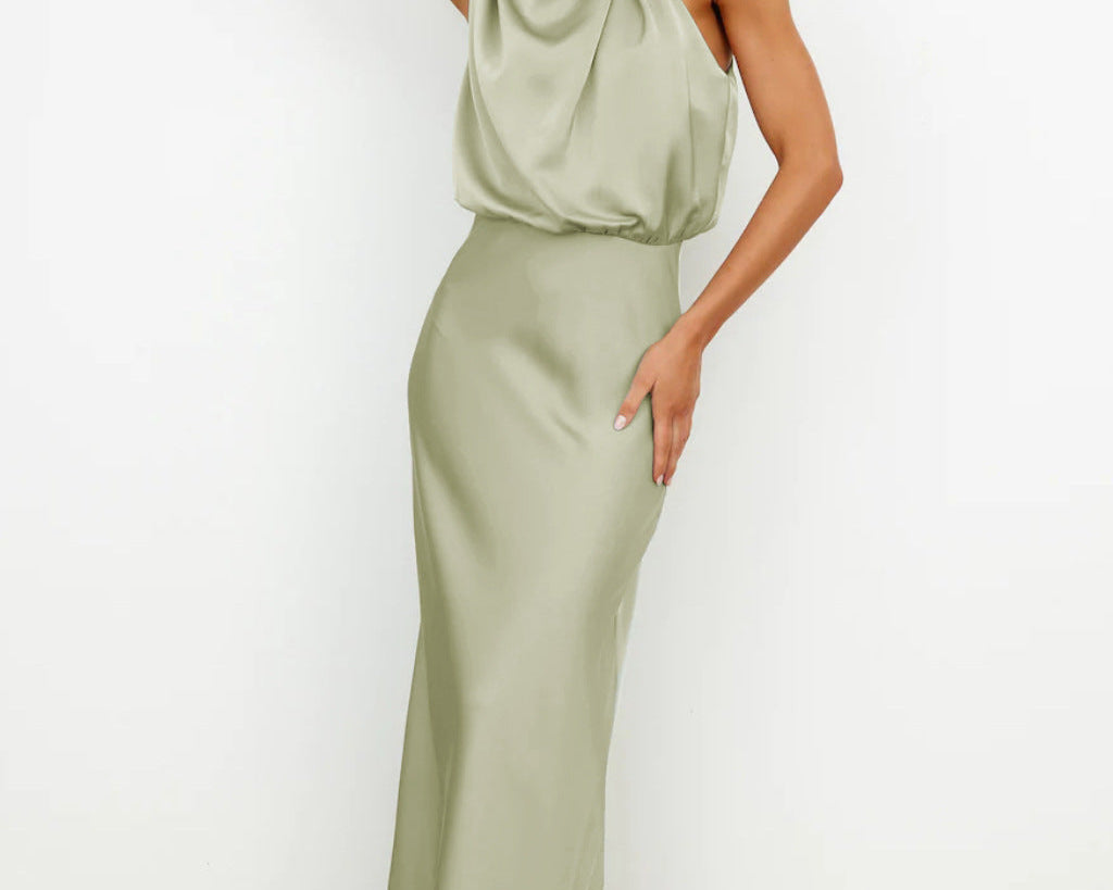 Antea – Satenska halter-neck haljina koja sjaji poput Jadrana na zalasku sunca