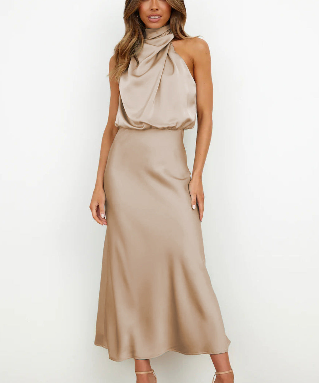 Antea – Satenska halter-neck haljina koja sjaji poput Jadrana na zalasku sunca