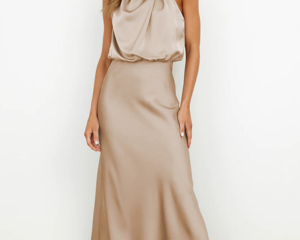 Antea – Satenska halter-neck haljina koja sjaji poput Jadrana na zalasku sunca