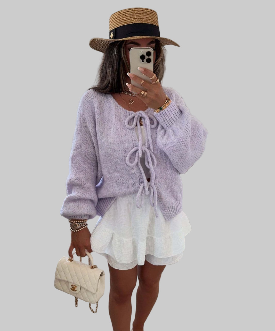 Amali – pletena jakna s mašnama za ženstveni, moderni izgled