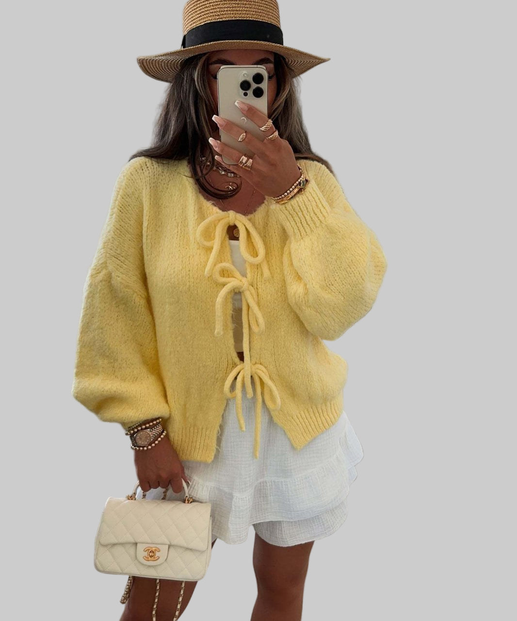 Amali – pletena jakna s mašnama za ženstveni, moderni izgled